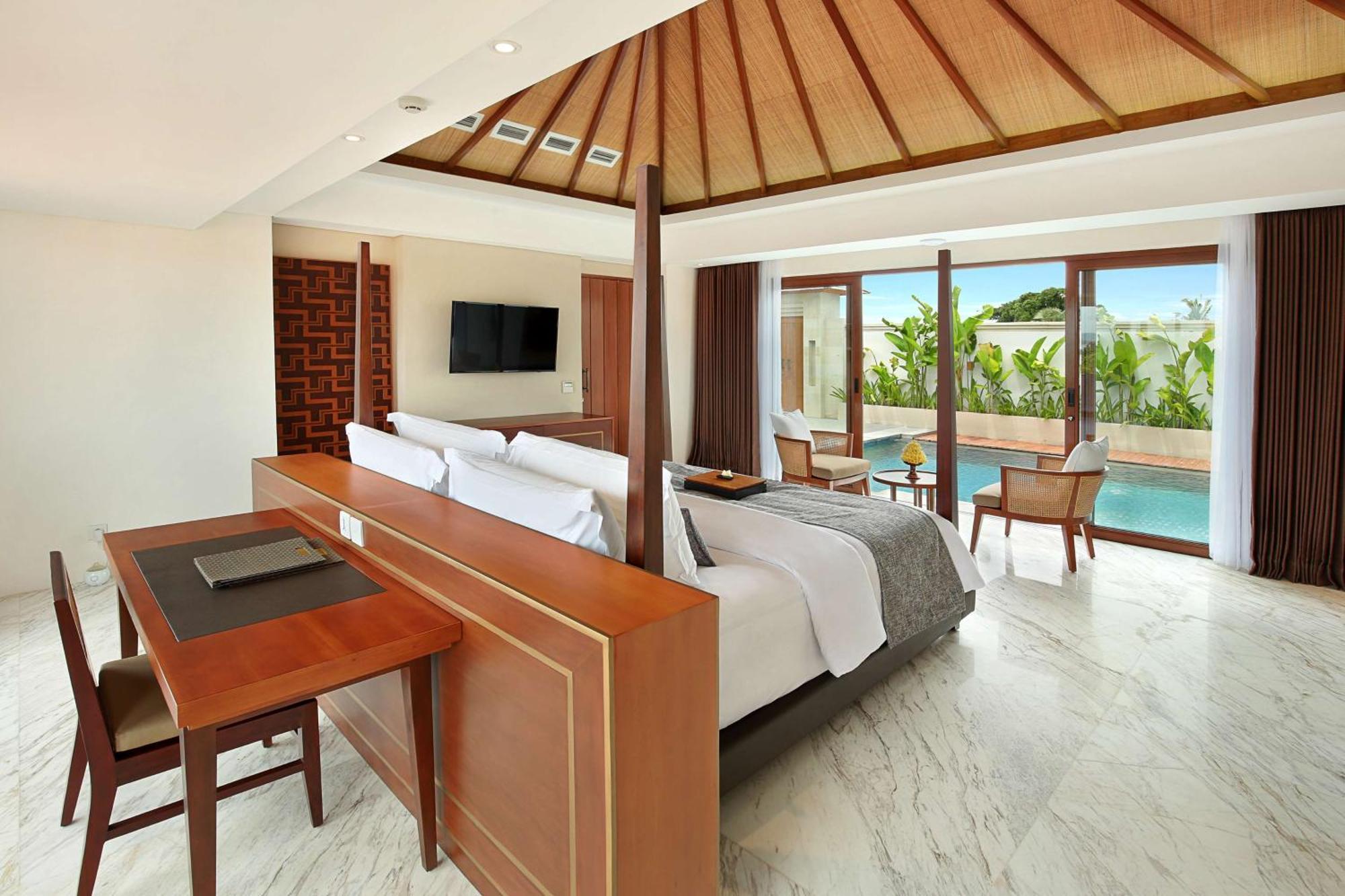The Bandha Hotel & Suites Legian Exterior foto A bedroom at the hotel